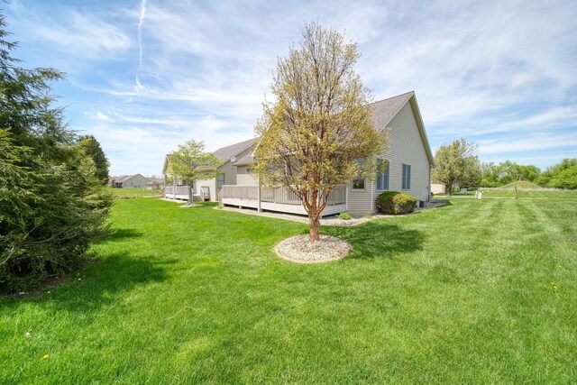 3605 Terrace Hills Ln, Jackson, MI 49203 - view of grassy yard with a wooden deck