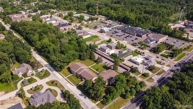 24111 Meridian Rd Unit 116, Grosse Ile, MI 48138 - view of property location with a forest and nearby suburban area