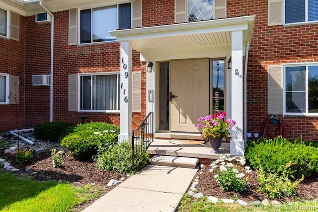 24111 Meridian Rd Unit 116, Grosse Ile, MI 48138 - entrance to property with brick siding and covered porch