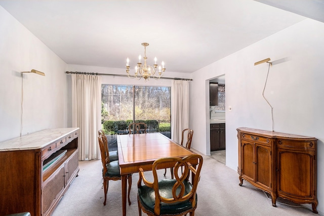 1750 Tiverton Rd Unit 28, Bloomfield Hills, MI 48304 - dining room featuring a chandelier and light colored carpet