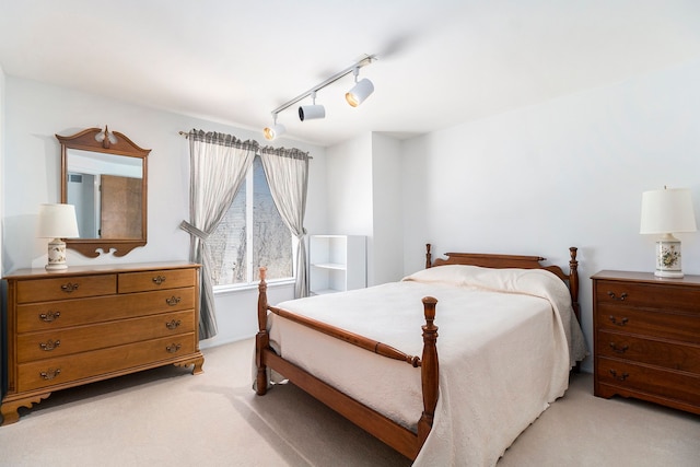 1750 Tiverton Rd Unit 28, Bloomfield Hills, MI 48304 - bedroom featuring light carpet and track lighting