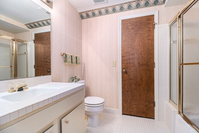 1750 Tiverton Rd Unit 28, Bloomfield Hills, MI 48304 - bathroom with toilet, tile patterned flooring, vanity, wallpapered walls, and shower / bath combination with glass door