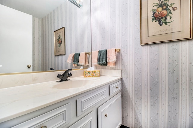 1750 Tiverton Rd Unit 28, Bloomfield Hills, MI 48304 - bathroom with wallpapered walls and vanity