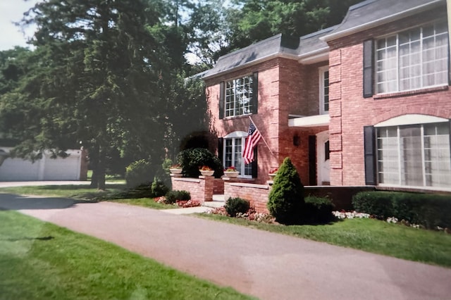 1750 Tiverton Rd Unit 28, Bloomfield Hills, MI 48304 - view of front of home featuring brick siding