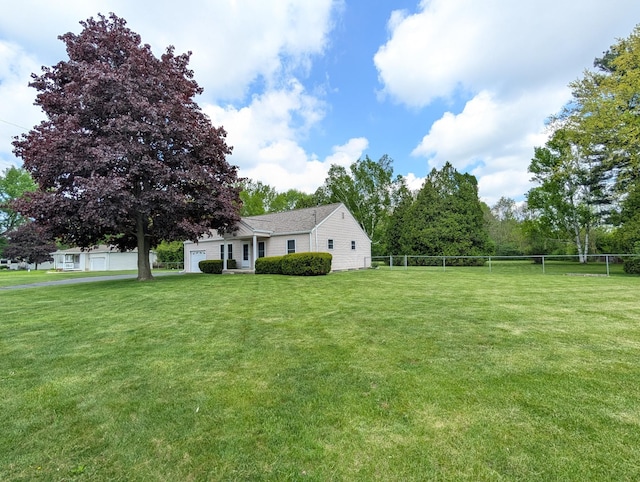 view of yard with an attached garage