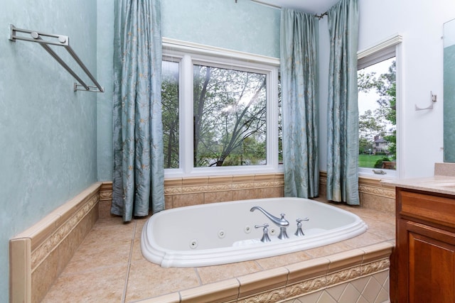 685 Dornoch Dr, Ann Arbor, MI 48103 - bathroom featuring plenty of natural light, a jetted tub, and vanity
