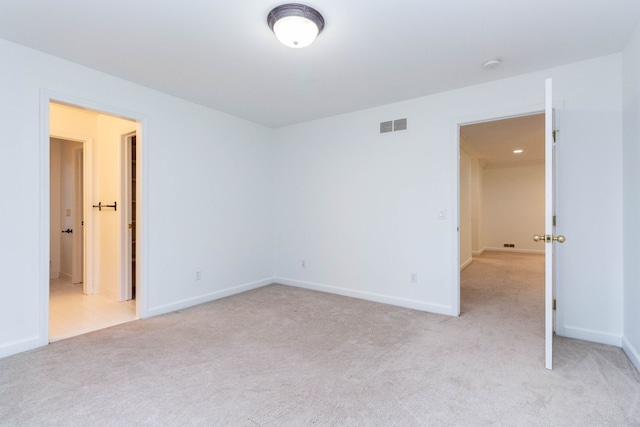 685 Dornoch Dr, Ann Arbor, MI 48103 - unfurnished bedroom featuring light colored carpet and baseboards