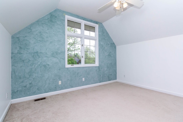 685 Dornoch Dr, Ann Arbor, MI 48103 - bonus room with vaulted ceiling, carpet, baseboards, and a ceiling fan