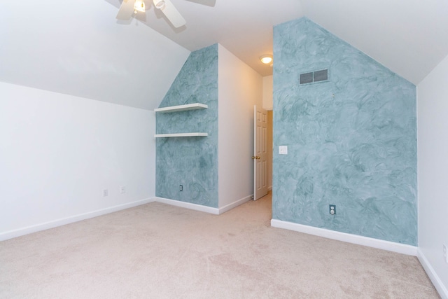 685 Dornoch Dr, Ann Arbor, MI 48103 - additional living space featuring lofted ceiling, a ceiling fan, carpet, and baseboards