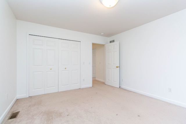 685 Dornoch Dr, Ann Arbor, MI 48103 - unfurnished bedroom featuring carpet floors, baseboards, and a closet