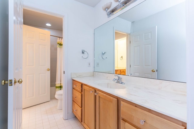685 Dornoch Dr, Ann Arbor, MI 48103 - bathroom featuring tile patterned floors, toilet, and vanity