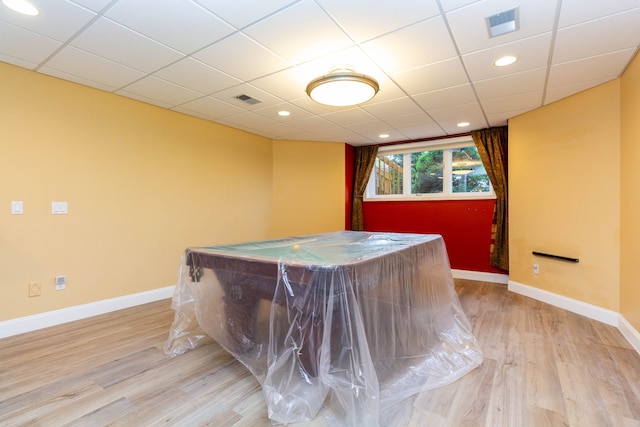 685 Dornoch Dr, Ann Arbor, MI 48103 - recreation room with wood finished floors, baseboards, a drop ceiling, and recessed lighting
