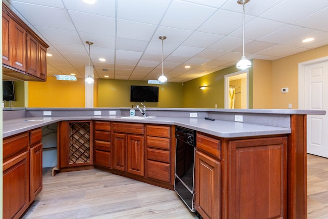 685 Dornoch Dr, Ann Arbor, MI 48103 - kitchen featuring a sink, black dishwasher, decorative light fixtures, light wood-type flooring, and recessed lighting