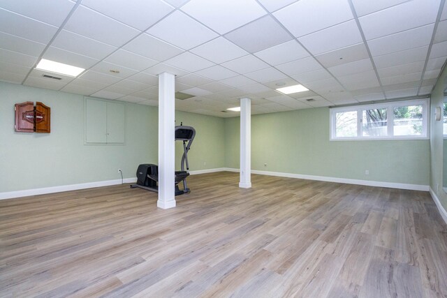 685 Dornoch Dr, Ann Arbor, MI 48103 - below grade area with light wood-style flooring, baseboards, and a drop ceiling