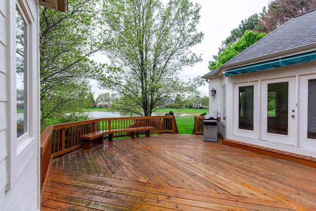 685 Dornoch Dr, Ann Arbor, MI 48103 - wooden terrace with area for grilling and a water view