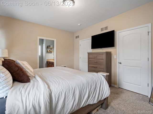 45877 Andrew Dr, Macomb, MI 48044 - bedroom with light colored carpet and ensuite bathroom