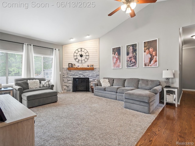 45877 Andrew Dr, Macomb, MI 48044 - living area featuring a ceiling fan, a stone fireplace, high vaulted ceiling, and dark wood-style flooring