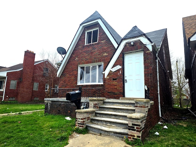 19183 Yonka St, Detroit, MI 48234 - back of property with brick siding and a yard