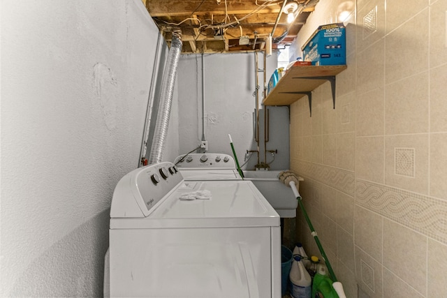 6809 Kingsley St, Dearborn, MI 48126 - laundry room with separate washer and dryer and a textured wall