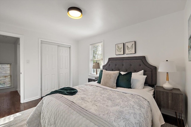 16573 Griggs St, Detroit, MI 48221 - bedroom featuring wood finished floors, a closet, and baseboards