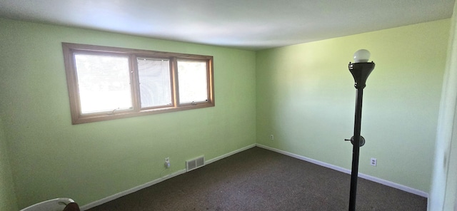 9608 Mercedes, Redford, MI 48239 - spare room featuring dark carpet and baseboards