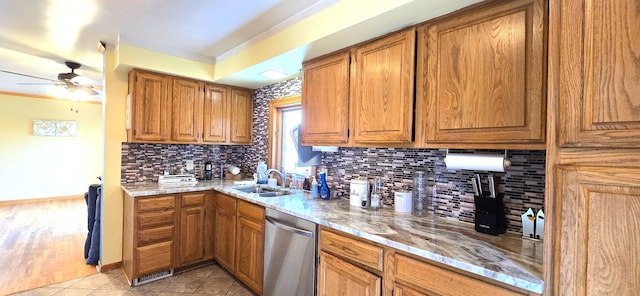 9608 Mercedes, Redford, MI 48239 - kitchen featuring dishwasher, a sink, tasteful backsplash, a ceiling fan, and brown cabinetry