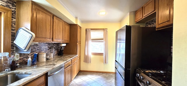 9608 Mercedes, Redford, MI 48239 - kitchen with stainless steel appliances, tasteful backsplash, brown cabinetry, and ornamental molding