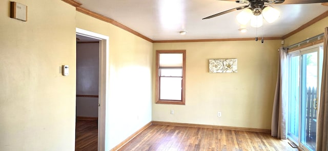 9608 Mercedes, Redford, MI 48239 - unfurnished room featuring light wood-style flooring, crown molding, a ceiling fan, and baseboards