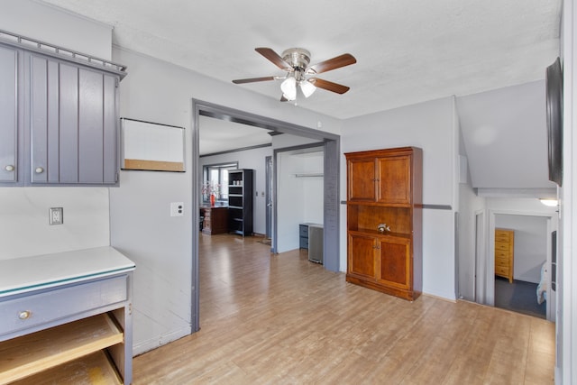 13626 Leisure Dr, Warren, MI 48088 - kitchen with a ceiling fan, light wood-style floors, and light countertops