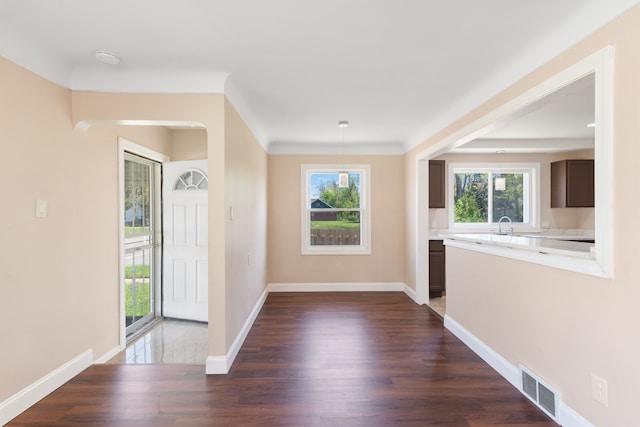 11580 Findlay St, Detroit, MI 48205 - entryway with dark wood-style flooring and baseboards