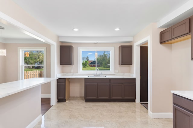 11580 Findlay St, Detroit, MI 48205 - kitchen with a sink, light countertops, baseboards, recessed lighting, and pendant lighting