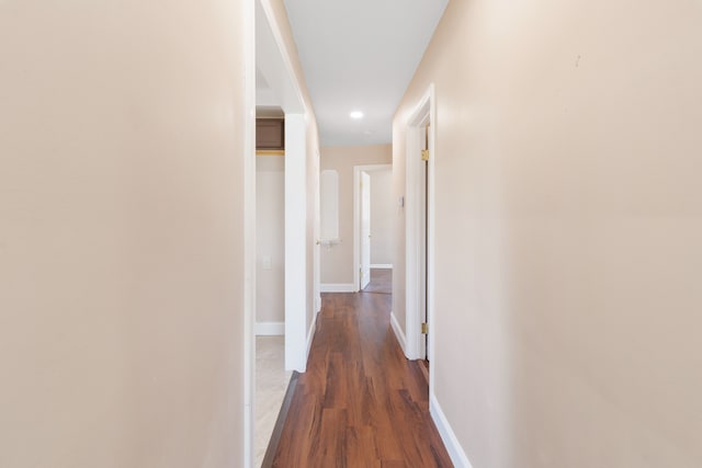 11580 Findlay St, Detroit, MI 48205 - hallway featuring dark wood-style flooring, baseboards, and recessed lighting