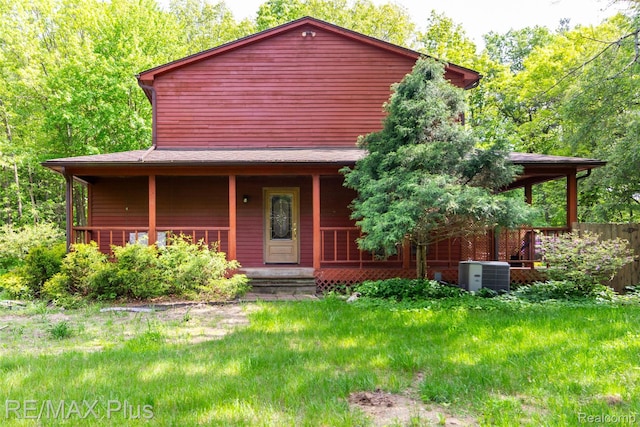 3168 Farmbrook Ln, Metamora, MI 48455 - rustic home with covered porch and central AC unit