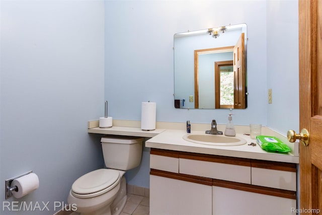 3168 Farmbrook Ln, Metamora, MI 48455 - half bath with toilet, vanity, and tile patterned flooring