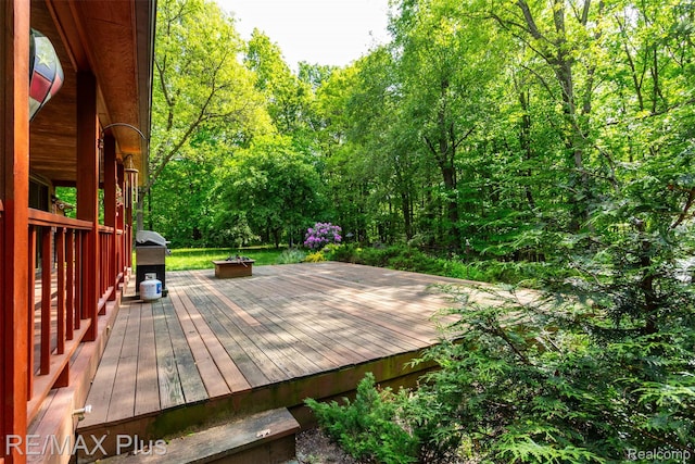 3168 Farmbrook Ln, Metamora, MI 48455 - wooden deck featuring grilling area
