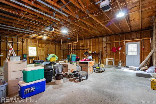 3168 Farmbrook Ln, Metamora, MI 48455 - garage with a garage door opener