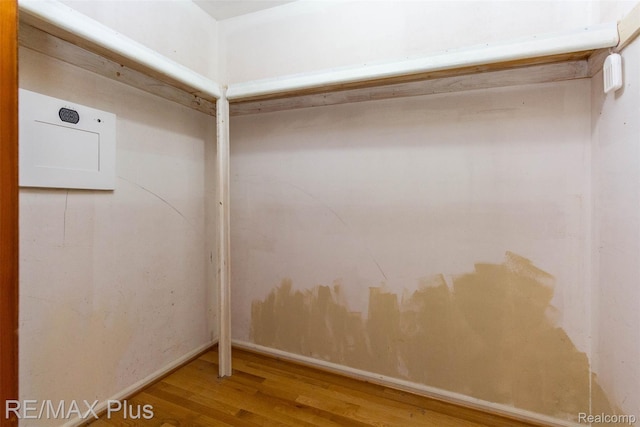 3168 Farmbrook Ln, Metamora, MI 48455 - walk in closet featuring wood finished floors