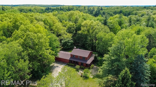 3168 Farmbrook Ln, Metamora, MI 48455 - aerial view of property and surrounding area with a heavily wooded area