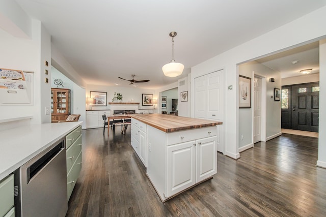 2142 Spring Ridge Dr, Ann Arbor, MI 48103 - kitchen with butcher block counters, dishwasher, a ceiling fan, white cabinets, and dark wood-type flooring