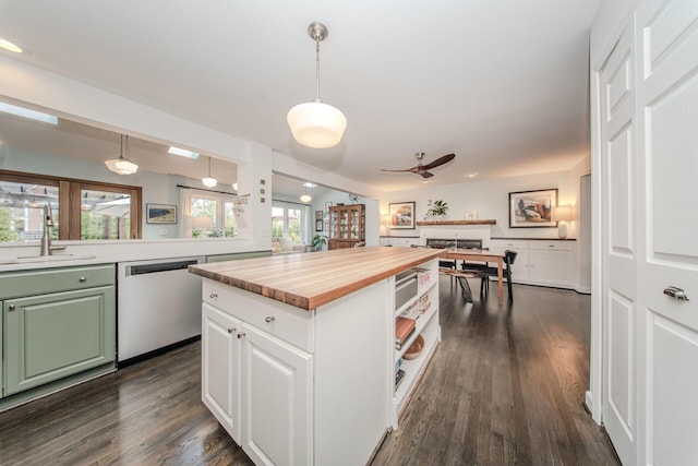 2142 Spring Ridge Dr, Ann Arbor, MI 48103 - kitchen featuring stainless steel dishwasher, a sink, wooden counters, a ceiling fan, and dark wood-style flooring