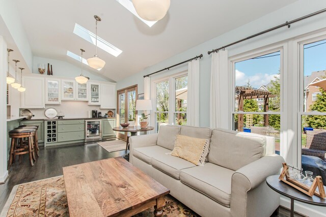 2142 Spring Ridge Dr, Ann Arbor, MI 48103 - living area featuring wine cooler, dark wood-type flooring, and vaulted ceiling