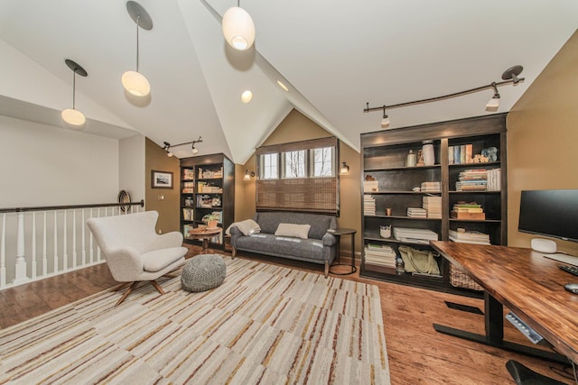 2142 Spring Ridge Dr, Ann Arbor, MI 48103 - office featuring wood finished floors, lofted ceiling, and track lighting