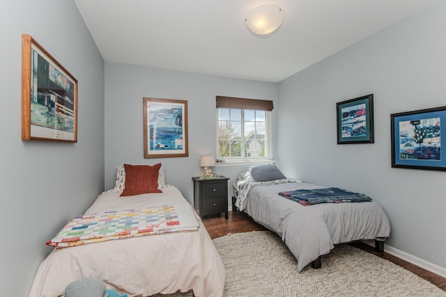 2142 Spring Ridge Dr, Ann Arbor, MI 48103 - bedroom featuring wood finished floors and baseboards