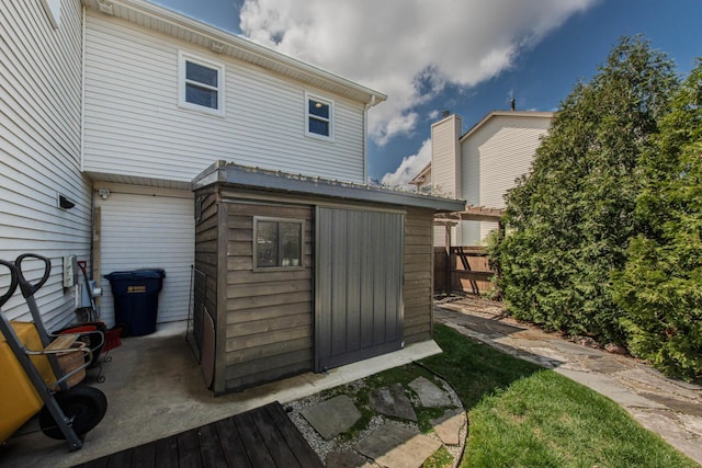 2142 Spring Ridge Dr, Ann Arbor, MI 48103 - back of property featuring fence and an outdoor structure