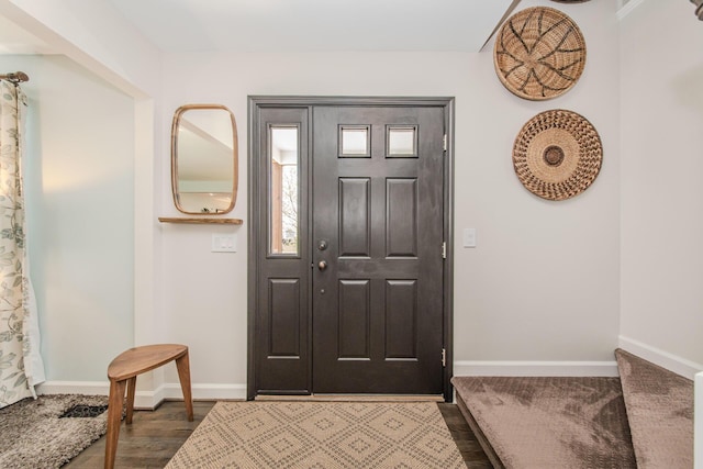 2142 Spring Ridge Dr, Ann Arbor, MI 48103 - foyer with baseboards and dark wood-style floors