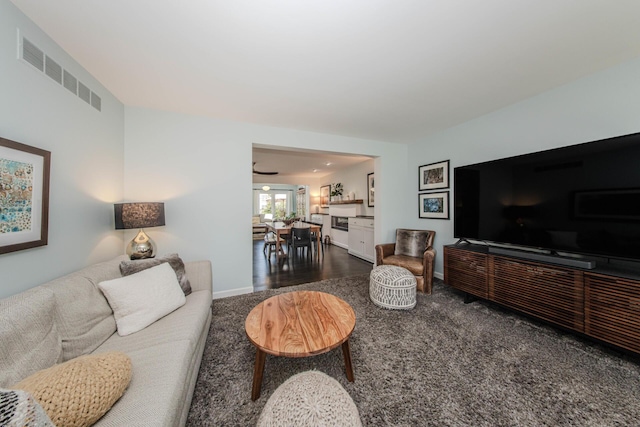 2142 Spring Ridge Dr, Ann Arbor, MI 48103 - living room with carpet flooring and baseboards