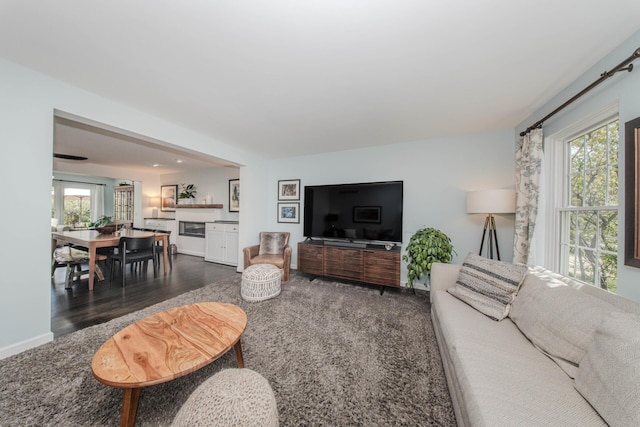 2142 Spring Ridge Dr, Ann Arbor, MI 48103 - living room with plenty of natural light, wood finished floors, and baseboards