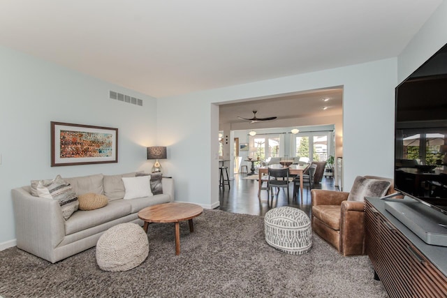 2142 Spring Ridge Dr, Ann Arbor, MI 48103 - living room featuring a ceiling fan and baseboards