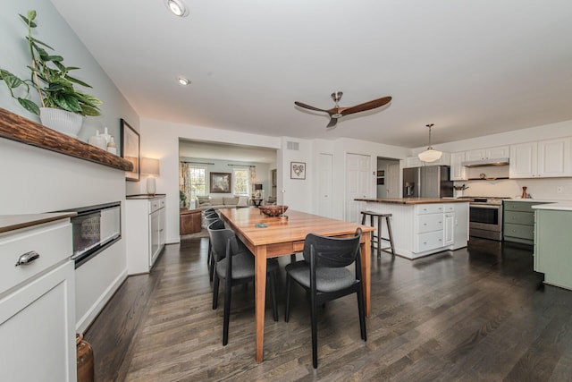 2142 Spring Ridge Dr, Ann Arbor, MI 48103 - dining space featuring dark wood-style flooring, ceiling fan, and recessed lighting