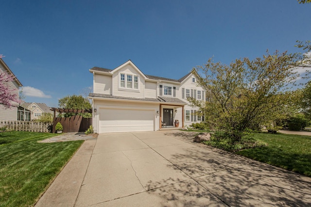 2142 Spring Ridge Dr, Ann Arbor, MI 48103 - traditional home with concrete driveway and an attached garage
